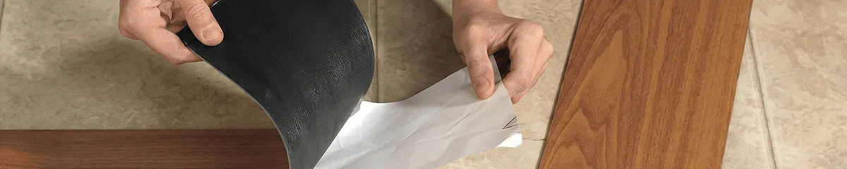 A professional installing vinyl flooring in Duluth, MN